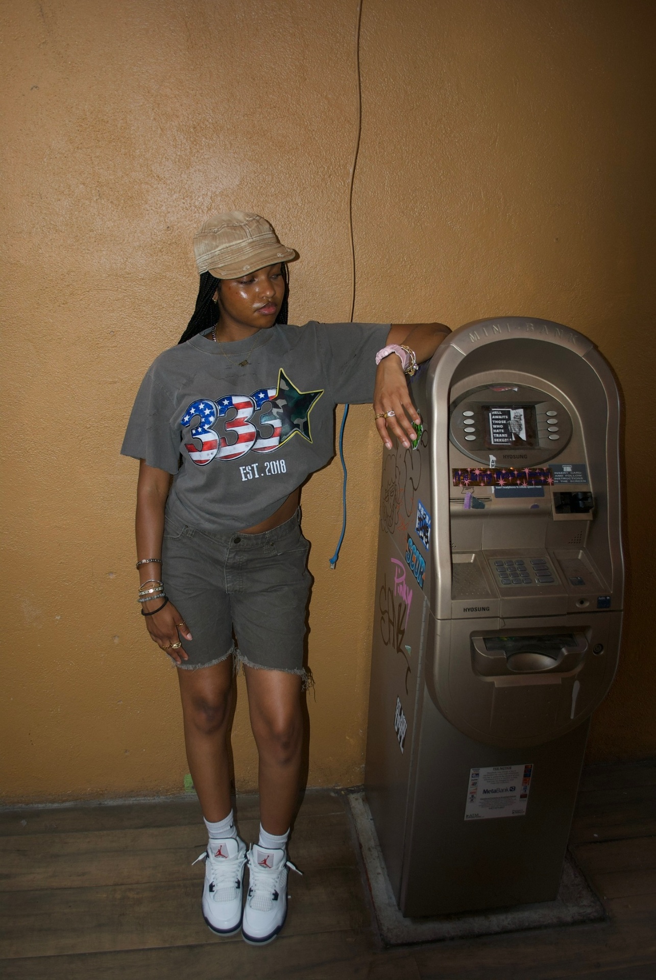 333 Est. 2018 tee styled with cargo shorts, worn in the neighborhood